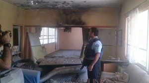 Photo: Israel Police / Rocket damage to house in Israel