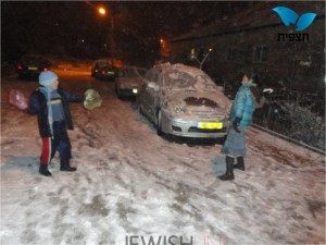 Photo credit: Michal Luz, kids playing in the snow at Beit-El.