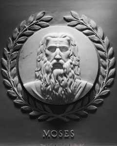  Photo: Architect of the Capitol  / Marble relief of Moses by artist Jean de Marco in U.S House of Representatives Chamber at the U.S. Capitol building. 