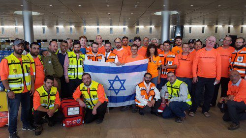 The Israeli delegation formed by IsraeLife, United Hatzalah, Zaka and F.I.R.S.T. prepare for take-off at Ben Gurion International Airport on Sunday.