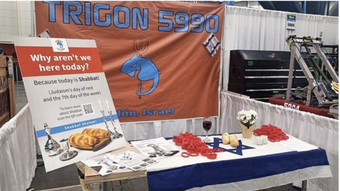 The Trigon 5990 robotics team in Modi’in, Israel, left their booth as is to celebrate Shabbat. Source: Twitter.